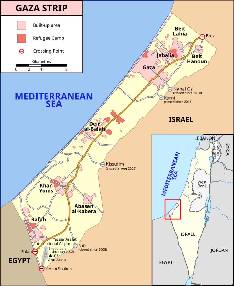 Map of Gaza Strip showing its place on the Mediterranean coast, its most-densely populated areas, refugee camps, cities, towns, villages, and crossing points.