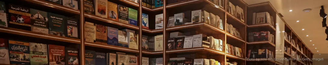 Bookshelves in a Gaza Strip bookstore after the 2021 war.