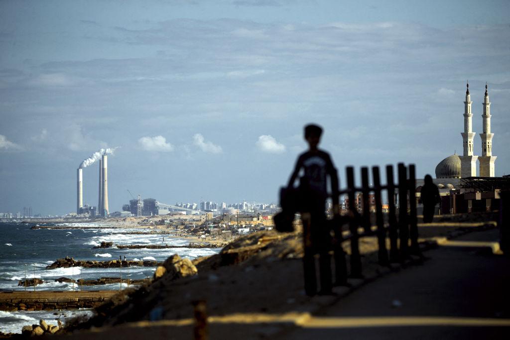 A child in the Shati Refugee camp looks towards Ashkelon, a city that many refugees in Gaza descend from. Despite its proximity, Palestinians in Gaza are now allowed to return to their original towns and villages.