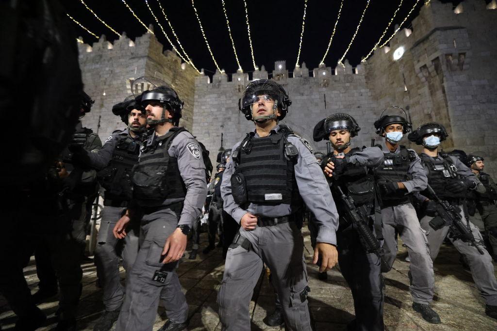 Large crowd of Israeli police surveil the Damascus Gate area in the Old City of Jerusalem in April 2021, during a period of heightened state and settler violence against Palestinians.