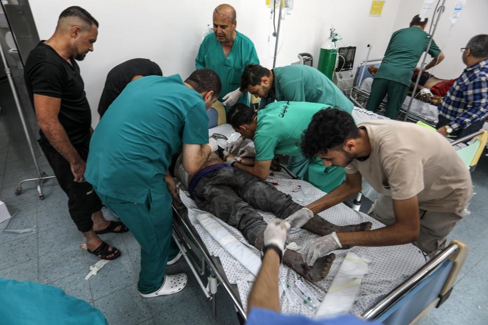 Medical team treats wounded patients at Al-Najjar Hospital after an Israeli attack. October 2023.