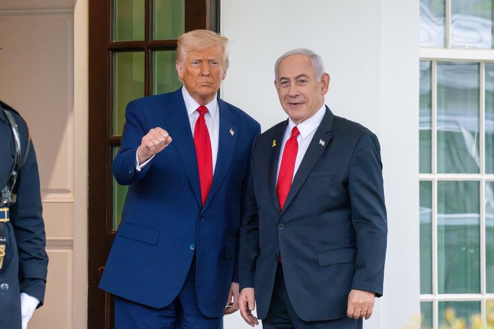 Trump and Netanyahu meet in front of the White House during Israel's genocide in Gaza.