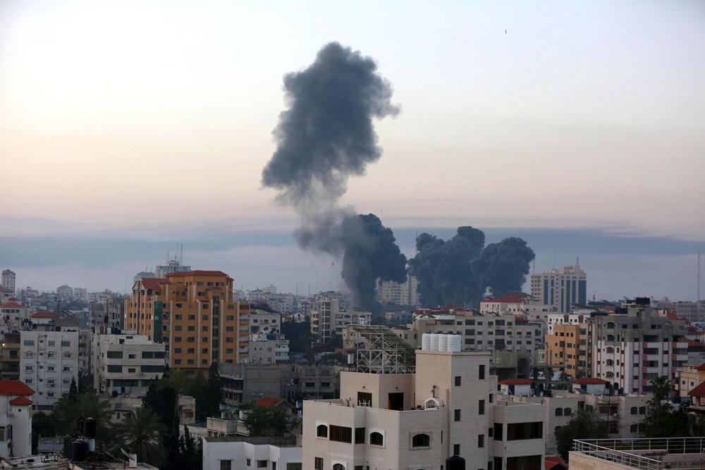 Smoke in the air from an Israeli air strike on residential high rise buildings in Gaza City on May 12, 2021.