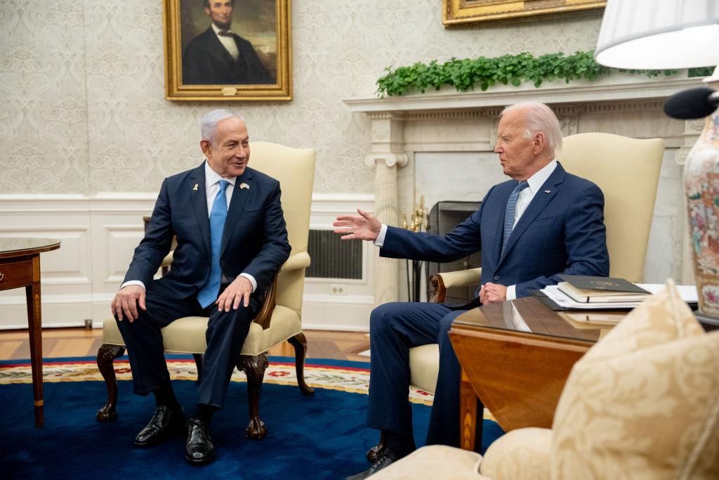 President Joe Biden meets with Israeli Prime Minister Benjamin Netanyahu in the Oval Office of the White House during Israel's genocide in Gaza.
