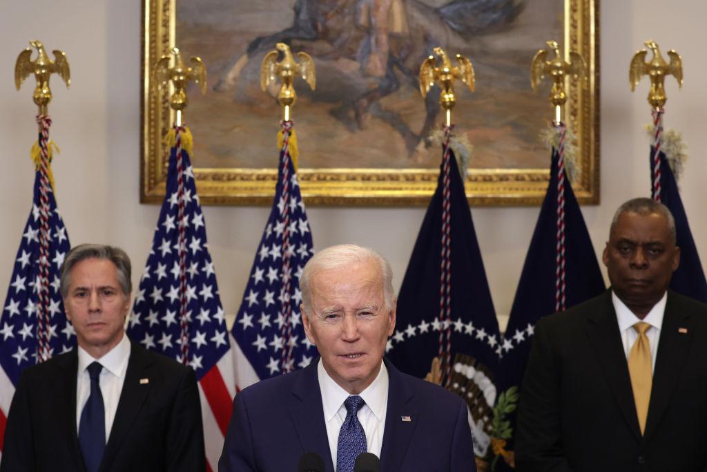 President Joe Biden speaks at a press conference. He is joined by Secretary of State Antony Blinken and Secretary of Defense Lloyd Austin.