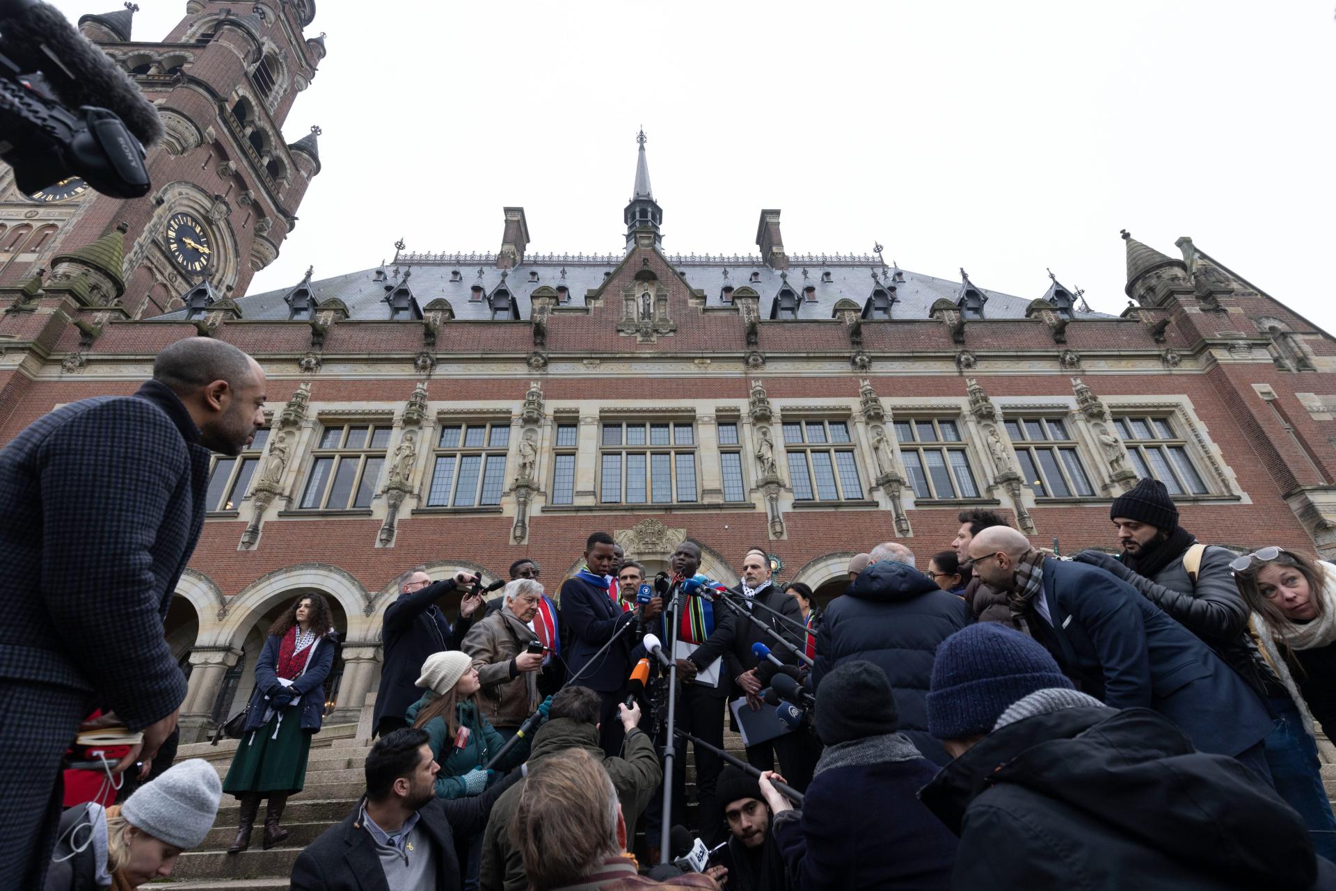 South African Minister of Justice, Ronald Lamola, addresses the media on the steps of the International Court of Justice (ICJ) after proceedings in South Africa's genocide case against Israel. January 11, 2024.