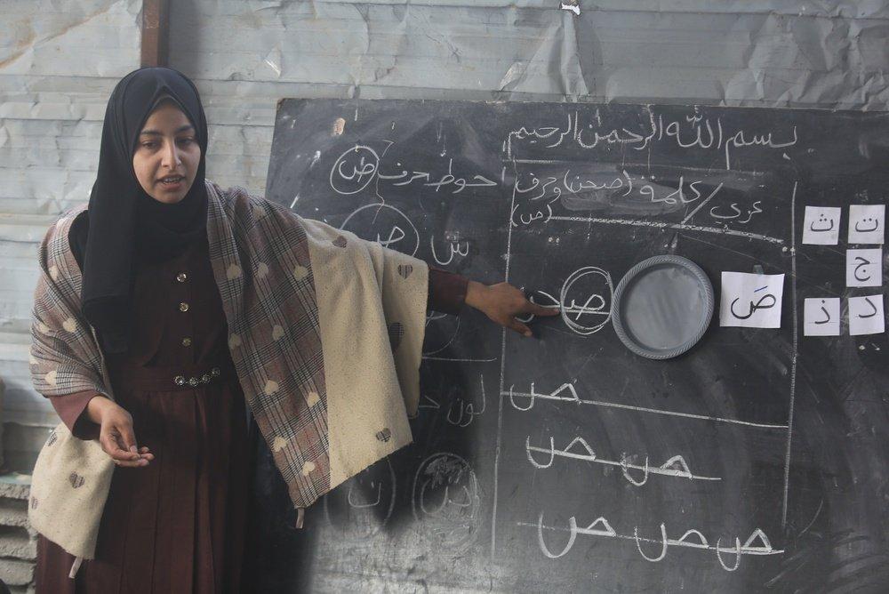 A teacher conducts her lesson at a school for displaced children in Gaza. January 28, 2026.