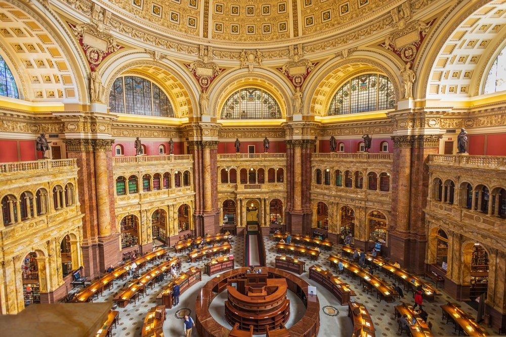 An image of an interior reading room at the Library of Congress in Washington, DC.