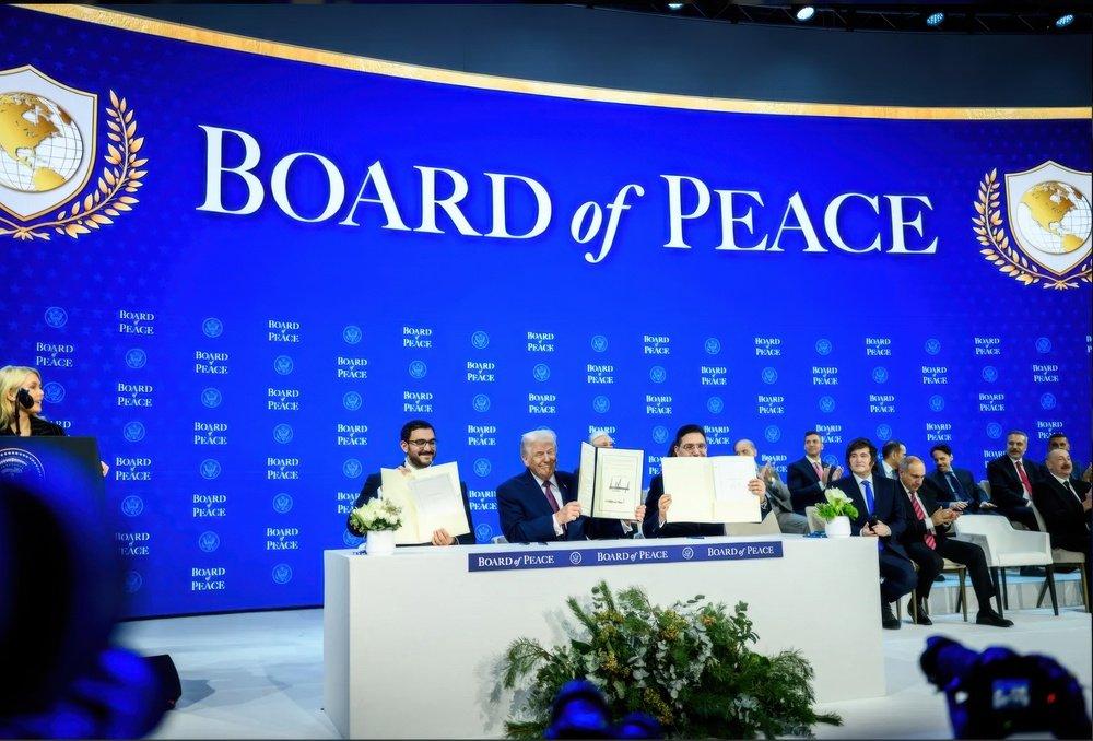 Trump and other Board of Peace members sign its charter at the World Economic Forum in Davos, Switzerland. January 22, 2026.