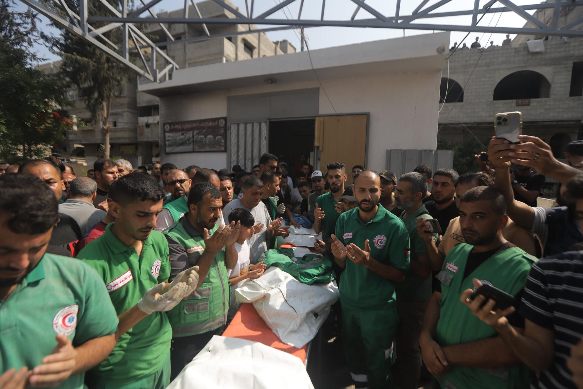 Palestinians including medical teams attend funeral ceremony of health workers and a journalist after Israeli army bombardment targeting healthcare workers who were carrying out rescue operations in Gaza Strip on June 10, 2025. Health workers Hussein Muhaysin, Wael Al-Attar, Baraa Faris Afaneh and journalist Moamen Abu Al-Awf lost their lives in the attack.