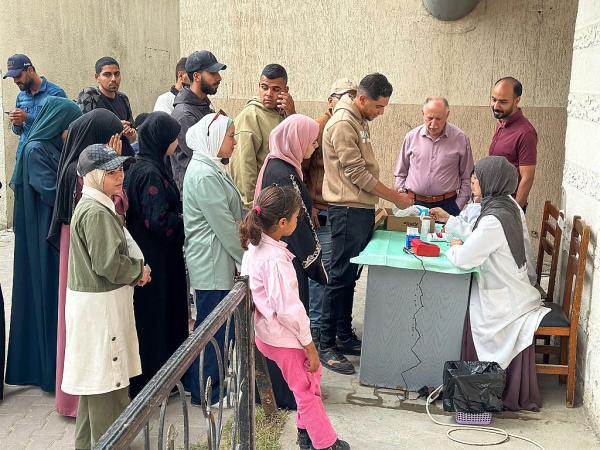 Palestinian volunteers line up to donate blood in the Gaza Strip.