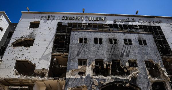 Destroyed remnants of the Shifa Hospital's Special Surgery Building in Gaza City, windows bombed, entire sections of building's facade missing due to Israeli bombs and shelling.