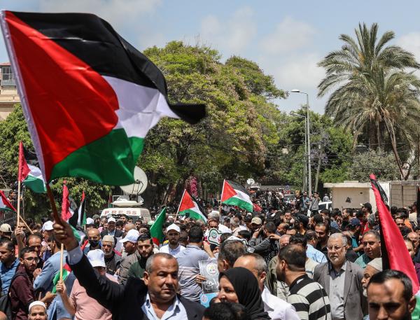 Palestinians rally to commemorate the 74th anniversary of the Nakba outside of UNESCO offices in Gaza City, 2022.