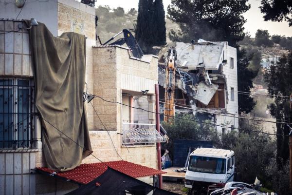 A home in the West Bank village of Tarqiyah near Hebron under demolition orders, as it is destroyed by the Israeli military.