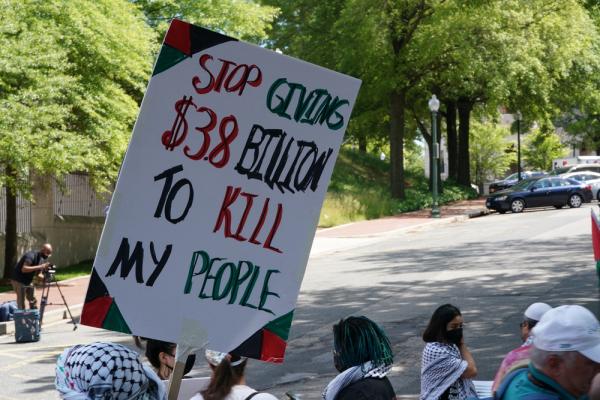 Protest sign says "STOP GIVING ISRAEL $3.8 BILLION TO KILL MY PEOPLE." May 2021.