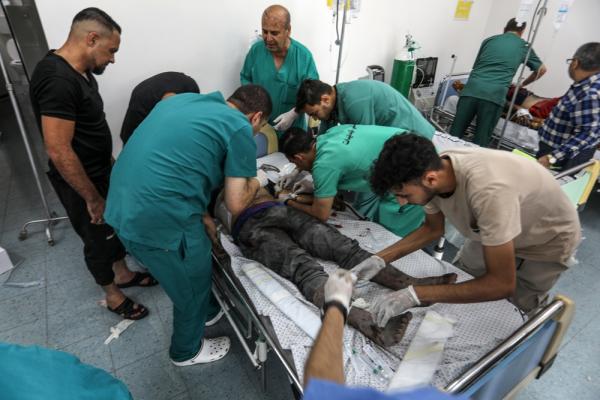 Medical team treats wounded patients at Al-Najjar Hospital after an Israeli attack. October 2023.
