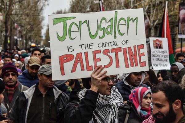 A rally in Italy against the Kushner-Greenblatt plan. One poster reads "Jerusalem is the capital of Palestine" in English. Another, in Italian, says, "the struggle will decide the fate of Jerusalem, not Trump." December 2017.