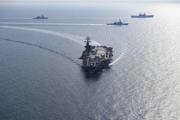 A US aircraft carrier moves through the Red Sea.