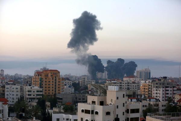 Smoke in the air from an Israeli air strike on residential high rise buildings in Gaza City on May 12, 2021.