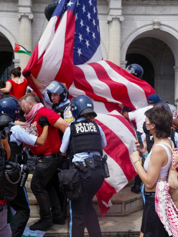 Police arrest protestor near the US Capitol as Israeli Prime Minister addresses congress during Israel's genocide in Gaza.