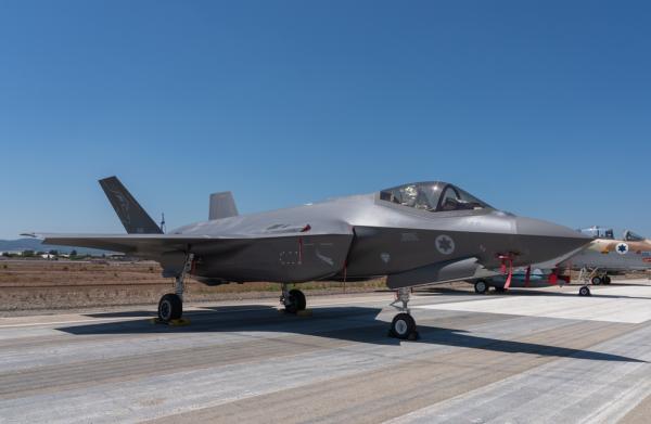 A new Israeli armed forces combat aircraft on a runway.