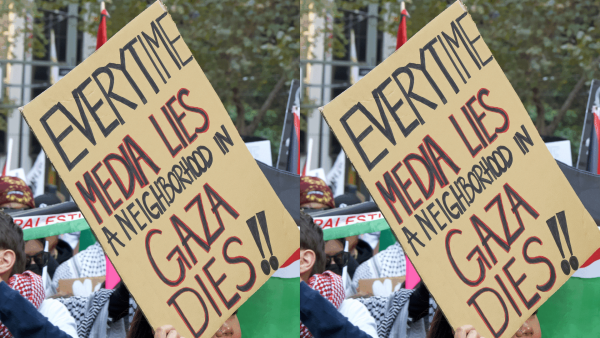 Protest sign that says "EVERY TIME MEDIA LIES, A NEIGHBORHOOD IN GAZA DIES."