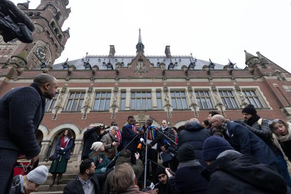 South African Minister of Justice, Ronald Lamola, addresses the media on the steps of the International Court of Justice (ICJ) after proceedings in South Africa's genocide case against Israel. January 11, 2024.