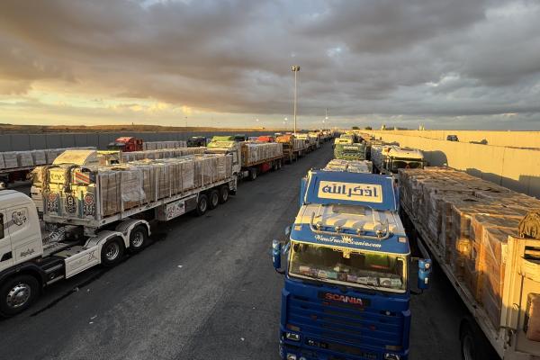 Long rows of humanitarian aid trucks are lined up on the Egyptian side of the Rafah Crossing as they await approval from Israel to cross into Gaza. October 12, 2025.