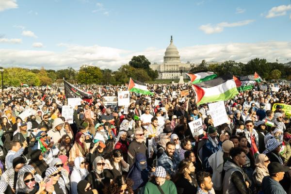 A large protest in Washington DC demanding a ceasefire in Gaza, with the Capitol Building in the background.