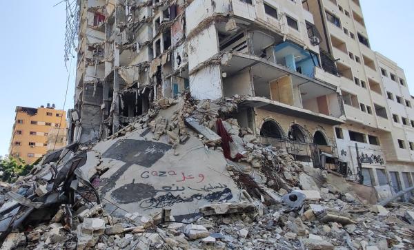 A view of graffiti on the ruins of a building destroyed in an Israeli airstrike on Gaza City. June 6, 2024.