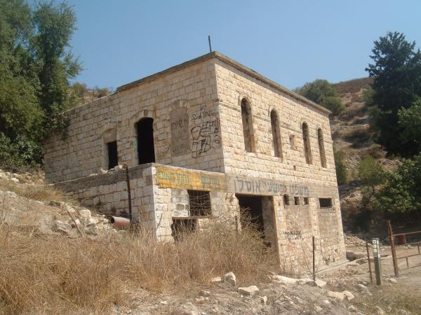 Ruins of a Palestinian home, vandalized with Hebrew graffiti, in the village of Ayn al-Zaytun near Safad in the upper Galilee. Ayn al-Zaytun was the site of a massacre and mass expulsion of Palestinians as part of Plan Dalet and the 1948 Nakba.