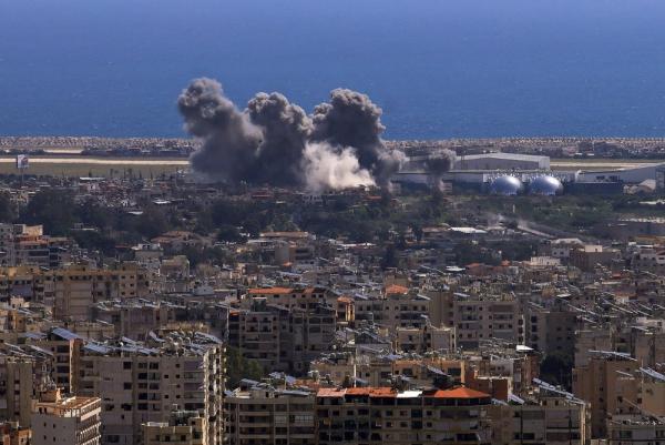 Aerial view of smoke rising in the aftermath of an Israeli airstrike on the Dahiyeh, or southern suburbs of Beirut as pictured from Baabda, Lebanon. April 11, 2026.
