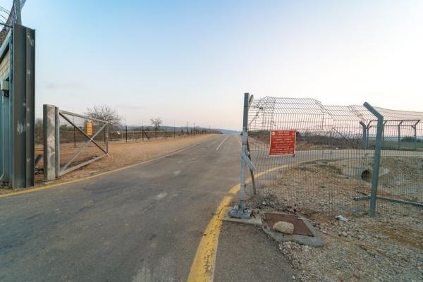 A view of an Israeli military checkpoint fence in the occupied West Bank.
